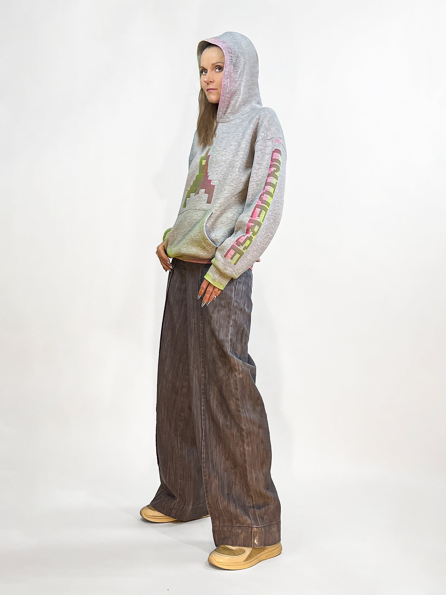 Pixelated Fighter Unisex Hoodie: Legendary Cosmic Arcade Design. Men Women